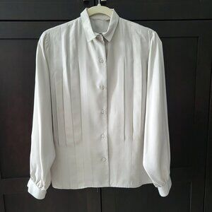 100% silk blouse. Size 4